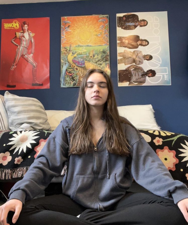 Violet Cole tries transcendental meditation. 