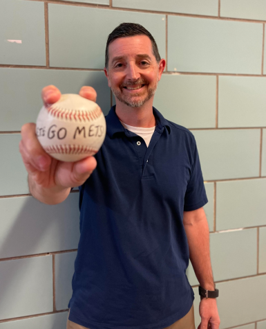 Mr. Roukis with his good luck baseball.