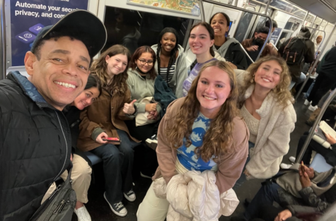 Actor Lane Napper from Victorious with (from Left to Right) Ms. DeStefano, Abigail Gottesmen, Jaquelin Pillco, Caroline Nicholas, Violet Cole, Lara Moninger, Ella Veith, and Ashley Geller during the NYC Through New Eyes Module. 
