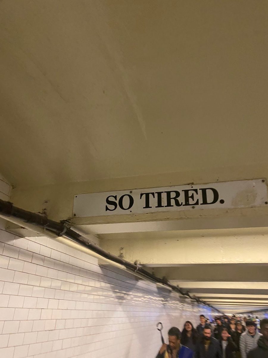 A subway sign that reads So Tired. 