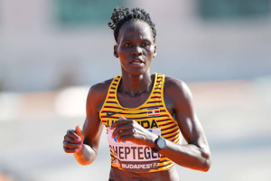 Photo of Rebecca Cheptegei, a Ugandan Olympic sprinter.  After she was killed, many headlines used the passive voice reporting her murder, e.g. “​​Olympian Rebecca Cheptegei Dies after Being Set on Fire by Ex-Boyfriend (BBC)” and “Rebecca Cheptegei, Olympic Runner From Uganda, Dies After Gasoline Attack (NYT)”