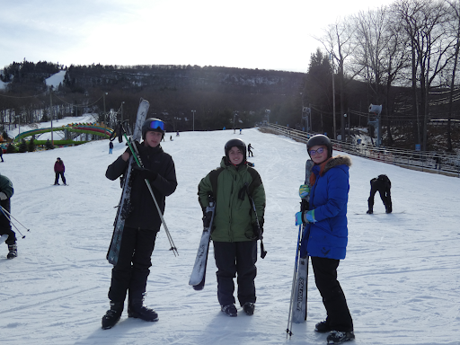 Seniors Nate Simon, Bo Buscarello, Aoife Moriarty enjoying skiing (pictured left to right)