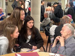 (L. r:) Juniors Marjorie Heard, Stephanie Yang, and Violet Shin-Nikulin interview Senior Nataliia, who was eager to talk to us and share wisdom and insight into her life.