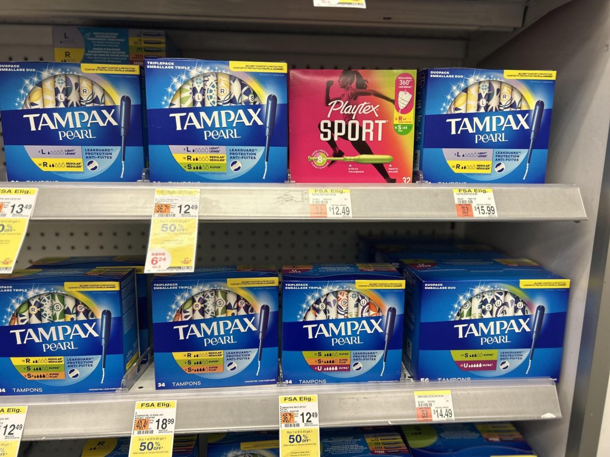 A selection of tampons at Walgreens ranging from $12.00 to $18.00. If a woman bought one box every month, it would cost around $150.00 which could be spent on other goods.