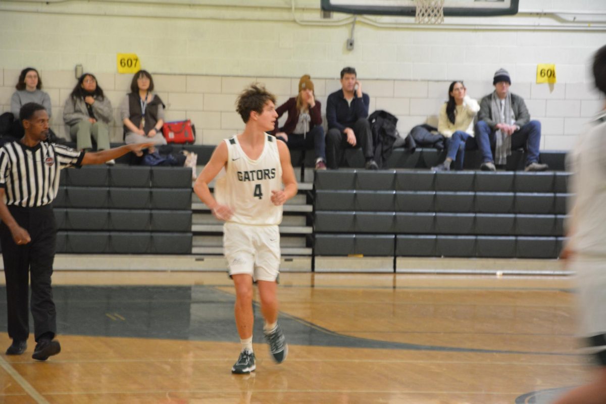 Leon Viger runs down the court.