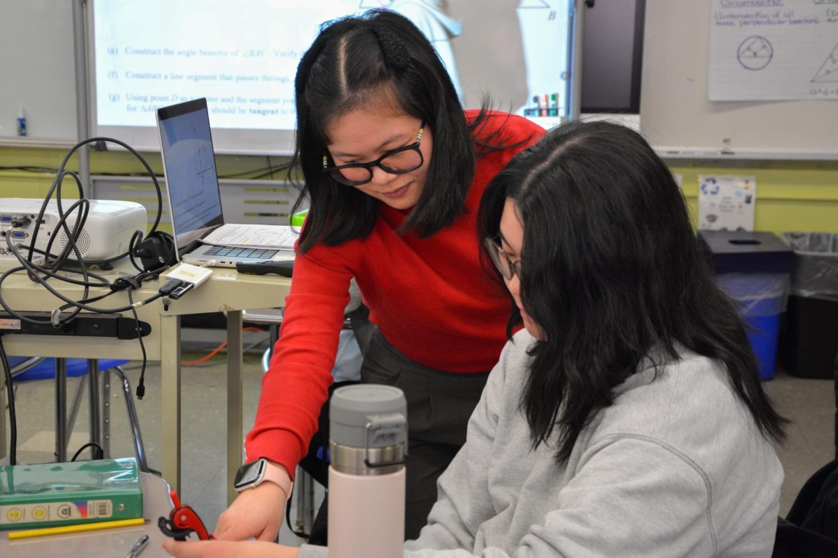 Mrs.Chen teaching student Rica Leung in Geometry class. 