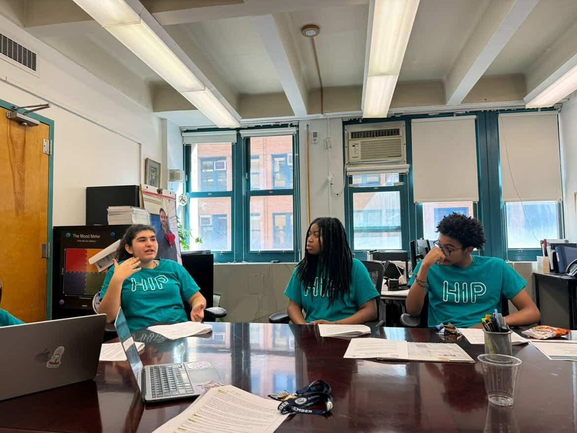 L to R: Sana Siddiq (11th), Laela-Marie Robinson (11th), Nicolas Silverio (11th), HIP members’ weekly meeting to reflect on the week and plan ahead for future lessons.