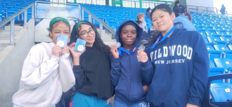 LMU relay team holding up their medals from the PSAL Manhattan Championships.
(Left to right): Charlize Longville (Junior), Ashley Cabral (Freshman), Zeniya Walford (Freshman), Mei Shibata (Junior)